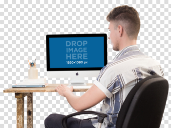 Placeit - PNG iMac Mockup of a Man Typing on his iMac