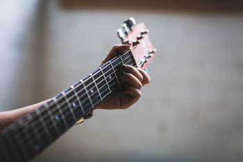 Playing Acoustic Guitar Playing Acoustic Guitar