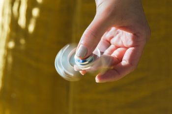 Playing With Fidget Spinner Playing With Fidget Spinner