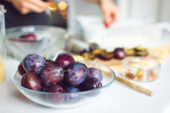 Plums ready for baking a cake Plums ready for baking a cake