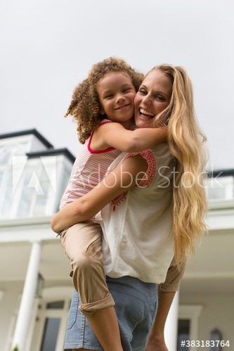 Portrait affectionate mother holding daughter Portrait affectionate mother holding daughter