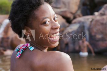 Portrait carefree young woman at lakeside Portrait carefree young woman at lakeside