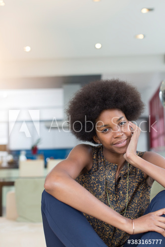 Portrait confident beautiful young woman with afro Portrait confident beautiful young woman with afro