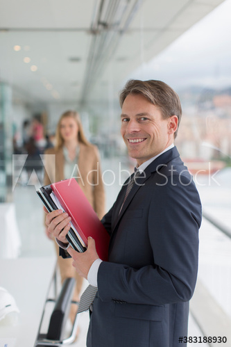 Portrait confident businessman in office Portrait confident businessman in office
