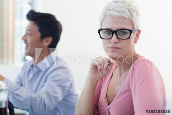 Portrait confident businesswoman in eyeglasses Portrait confident businesswoman in eyeglasses