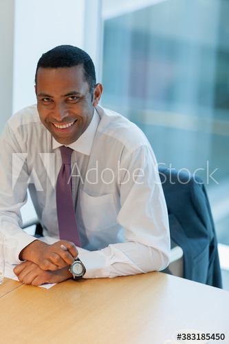 Portrait confident corporate businessman in office Portrait confident corporate businessman in office