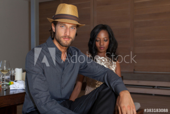Portrait confident handsome young man at party