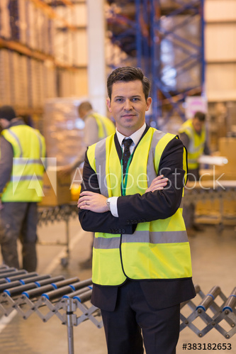 Portrait confident male manager in distribution warehouse Portrait confident male manager in distribution warehouse