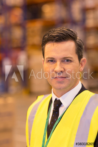Portrait confident male manager in warehouse Portrait confident male manager in warehouse