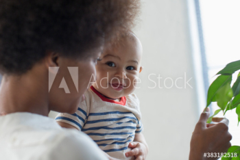 Portrait cute baby son with mother