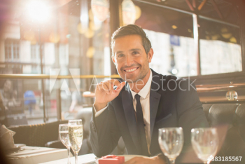 Portrait excited man preparing to propose in restaurant Portrait excited man preparing to propose in restaurant