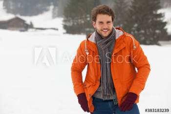 Portrait handsome young man in snow Portrait handsome young man in snow