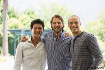 Portrait happy male friends on patio Portrait happy male friends on patio