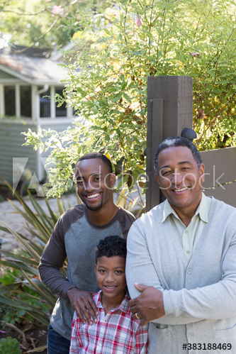 Portrait happy multi-generation men in backyard Portrait happy multi-generation men in backyard
