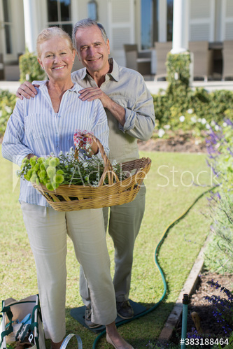 Portrait happy senior couple gardening Portrait happy senior couple gardening