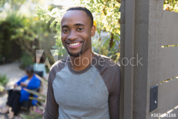 Portrait happy young man on patio Portrait happy young man on patio