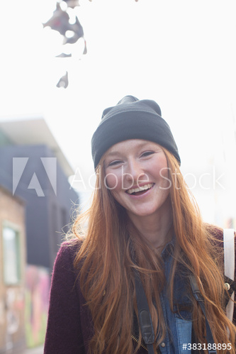 Portrait happy young woman laughing Portrait happy young woman laughing