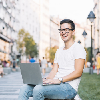 Portrait of a happy young man with laptop Portrait of a happy young man with laptop