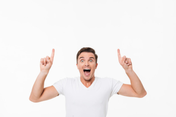 Portrait of an amused excited man in a white t-shirt Free Photo Portrait of an amused excited man in a white t-shirt Free Photo