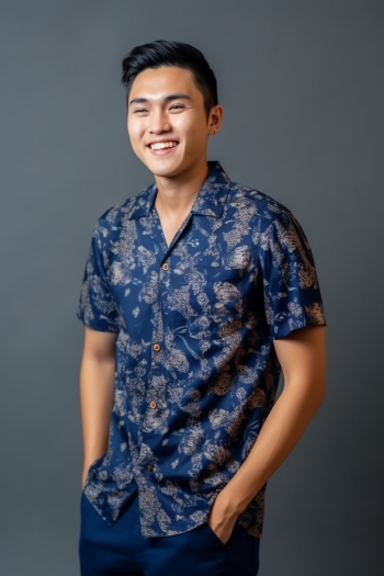 Portrait of an Asian young man wearing shirt, smiling generated by AI Portrait of an Asian young man wearing shirt, smiling generated by AI