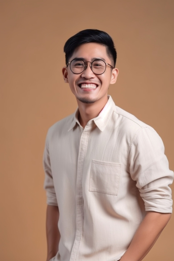Portrait of an Asian young man wearing shirt, smiling generated by AI Portrait of an Asian young man wearing shirt, smiling generated by AI