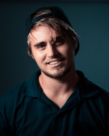 Portrait of Man Wearing Black Collared Top Portrait of Man Wearing Black Collared Top