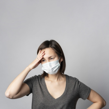 Portrait of young woman with illness symptom Free Photo