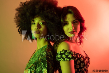 Portrait of young women standing indoors Portrait of young women standing indoors