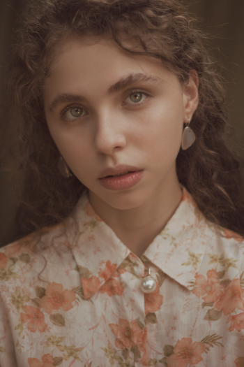 Portrait Photo of Woman Wearing Floral Top Portrait Photo of Woman Wearing Floral Top