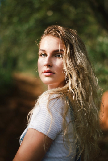 Portrait Photo of Woman Wearing White Top Portrait Photo of Woman Wearing White Top