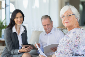 Portrait senior couple meeting with financial advisor Portrait senior couple meeting with financial advisor