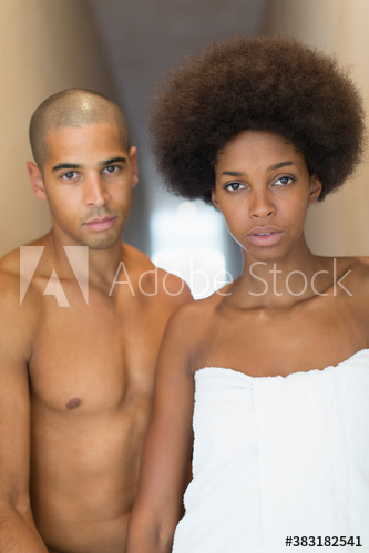 Portrait serious attractive young couple in bathroom Portrait serious attractive young couple in bathroom