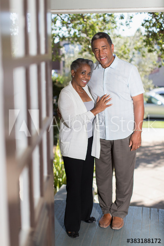 Portrait smiling senior couple on porch Portrait smiling senior couple on porch