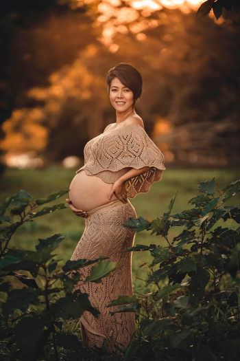 Pregnant Woman Beside Green Plants