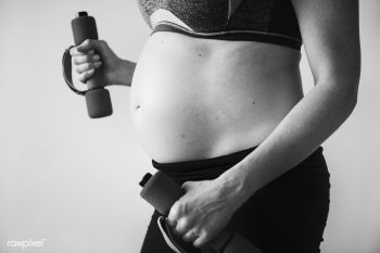 Pregnant woman doing light exercise | Free stock photo - 427502