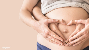 Pregnant woman on a beige background | Free  photo - 2323482