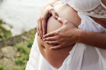 Pregnant Woman Wearing White Dress