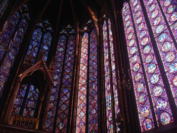purple stained glass of cathedral purple stained glass of cathedral