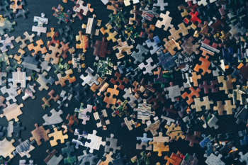 Puzzle Pieces On Navy Blue Puzzle Pieces On Navy Blue
