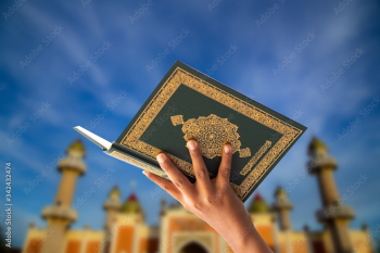 
Quran - holy book of Muslims religion, Concept: open book holy prayers for god,
 Friday In the month of Ramadan  religion Islamic worshiping faith and learn koran and rosary put on wooden  boards 