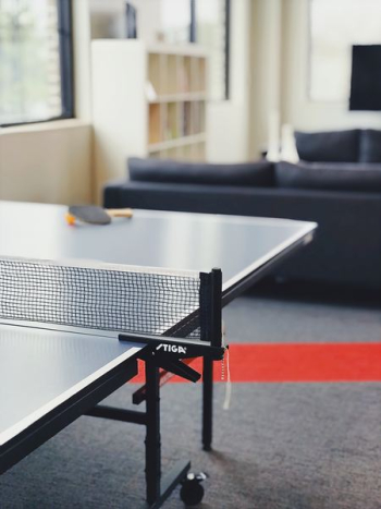 racket and ball on tennis table racket and ball on tennis table