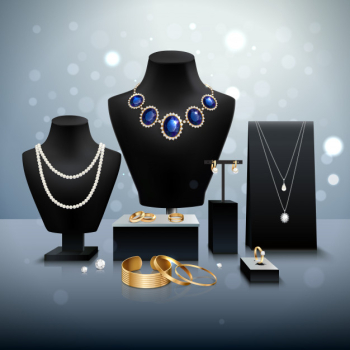 Realistic gold and silver jewelry display on black mannequins and stands on grey surface