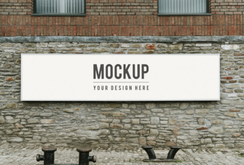 Rectangular public signage mockup on a brick wall Free Psd