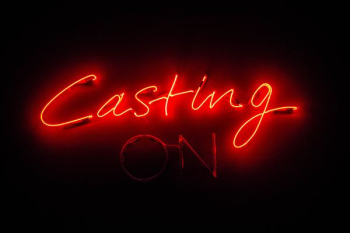 red Casting On neon light signage red Casting On neon light signage