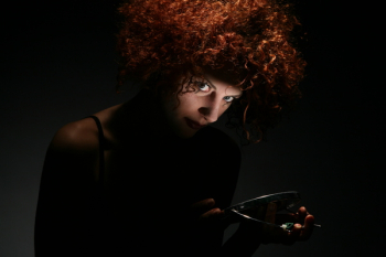 Red Haired Woman in Dark Room Red Haired Woman in Dark Room
