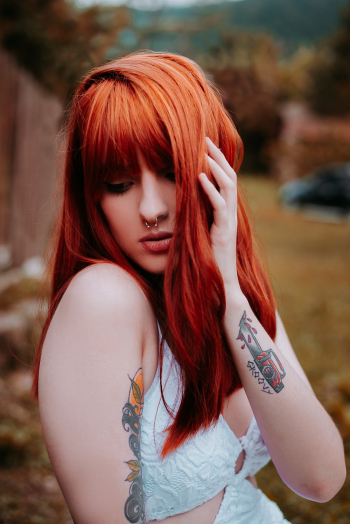 Red Haired Woman With Tattoo Red Haired Woman With Tattoo