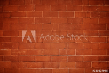 Reddish orange brick wall textured background Reddish orange brick wall textured background