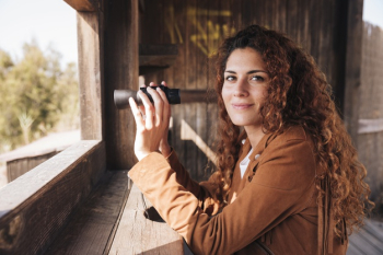 Redhead woman with binoculars Free Photo Redhead woman with binoculars Free Photo
