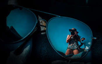 Reflection of People on Sunglasses Reflection of People on Sunglasses
