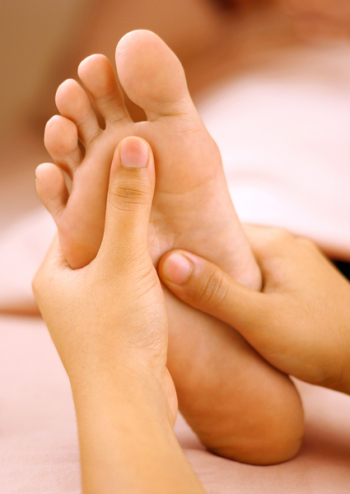 reflexology foot massage, spa foot treatment.